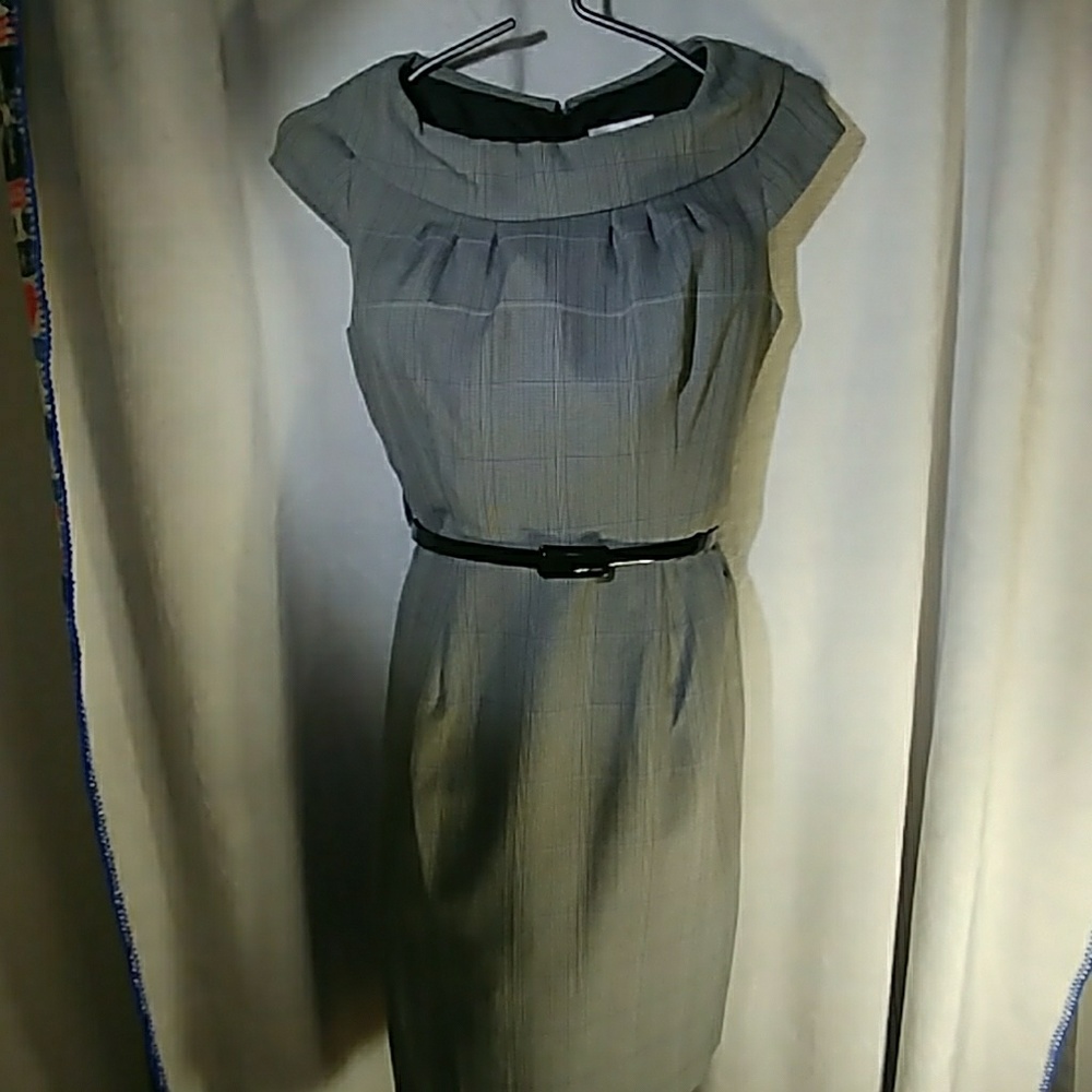Knee length black and white fitted dress